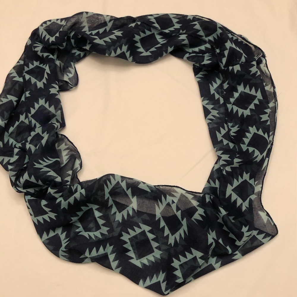 Tubal green and black scarf.